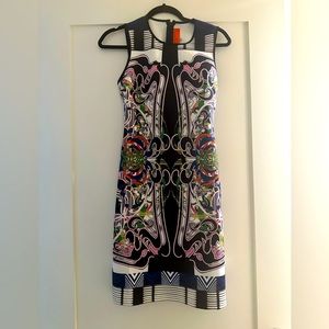 Stylish Clover Canyon dress. Elevate your Wardrobe with this vibrant dress.